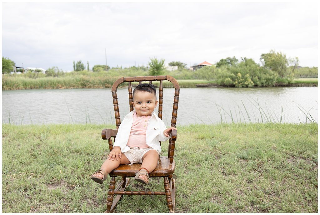 one year old pictures on a rocking chair
