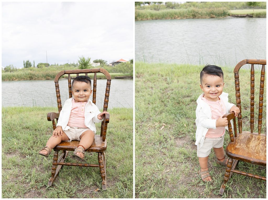 one year old by a rocking chair